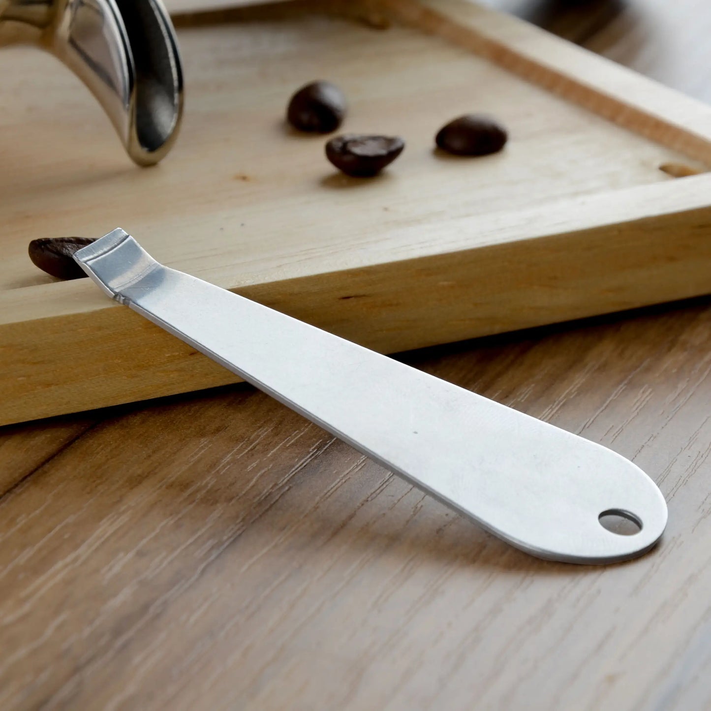 Portafilter basket opener